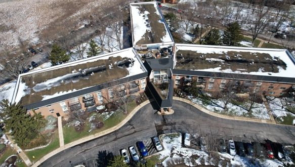 Repair area marked on a flat roof in Glen Ellyn, IL