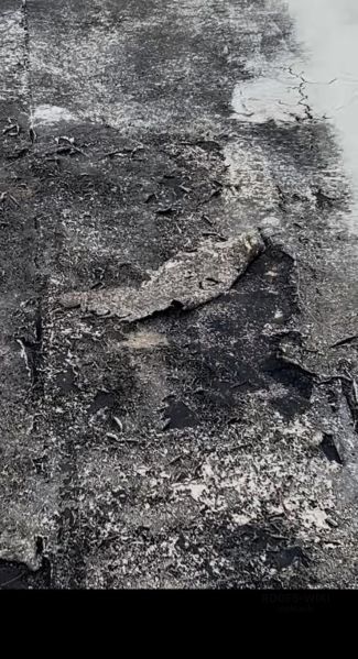 File:Weathered-and-patched-membrane-roof-north-miami-beach-b2-126.jpg
