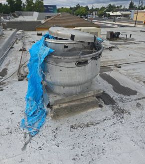 Emergency blue tarp on a damaged roof in Citrus Heights, CA
