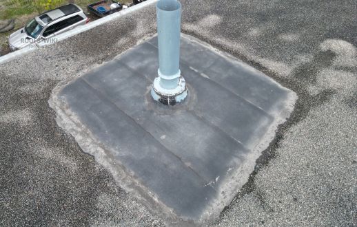 Vent pipe penetration on a flat roof in Pickering, ON