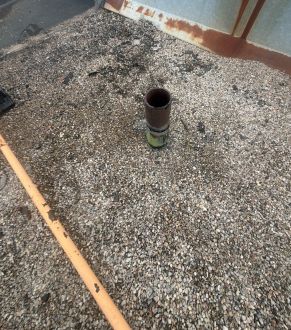 Vent stack on a flat roof in Oshawa, ON