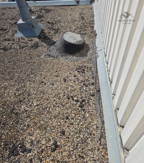 Metal coping on a parapet wall in Winnipeg, MB