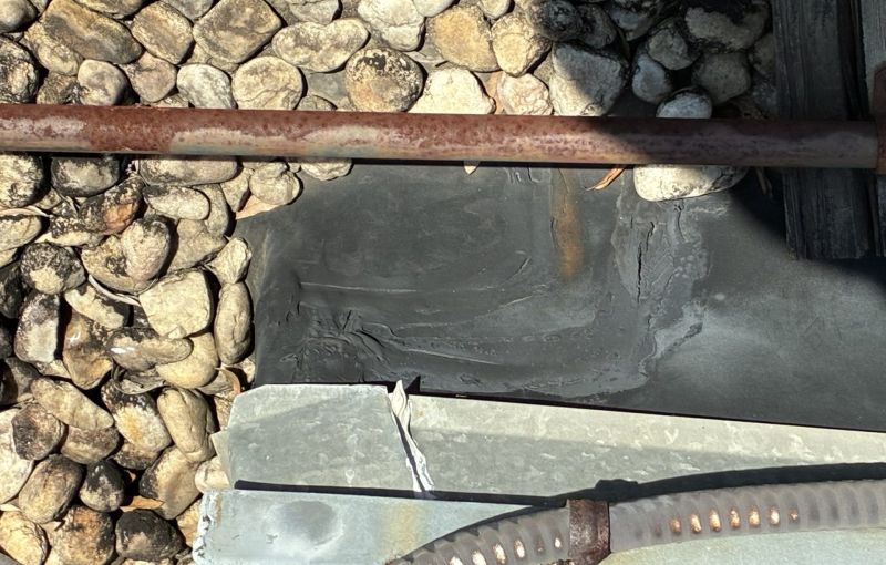 File:Pipe-and-metal-flashing-on-a-ballasted-gravel-ro-charlotte-244.jpg