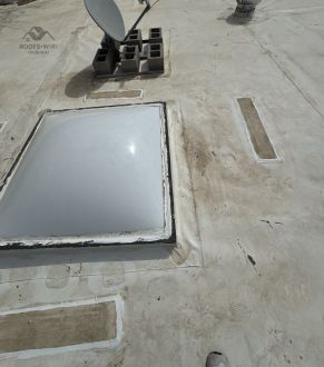 Scupper drain at a flat roof edge in Fort Worth, TX