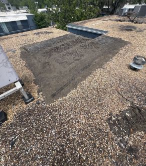 Ballasted gravel roof close-up in Gainesville, FL