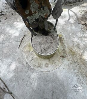 Scupper drain at a flat roof edge in Tampa, FL