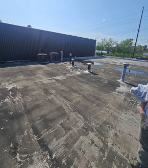 Reflective coating on a low-slope roof in Indianapolis, IN