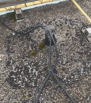 Roof drain on a flat membrane roof in Burlington