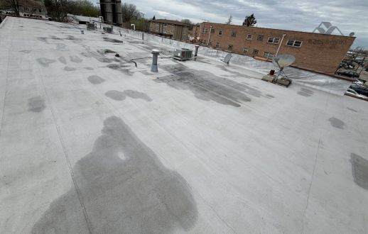 Long commercial flat roof with seams in Chicago, IL